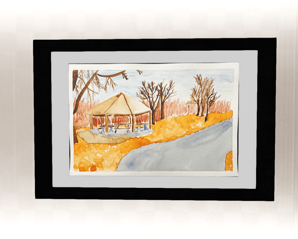 Framed watercolor study of a gazebo outside in fall.
